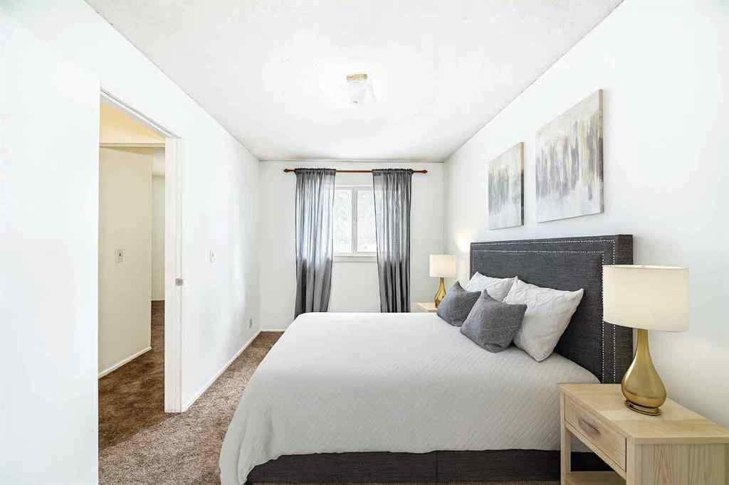MLS® A2247820 - Unit #65 5520 1 Avenue SE in Penbrooke Meadows Calgary, Residential