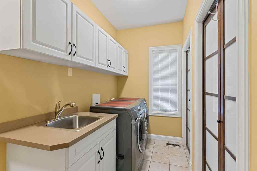 MLS® A2247831 - 38 Sienna Ridge Landing SW in Signal Hill Calgary, Residential
