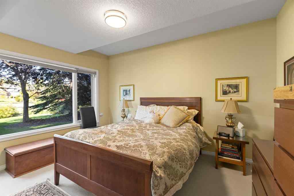 MLS® A2247831 - 38 Sienna Ridge Landing SW in Signal Hill Calgary, Residential