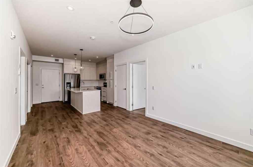 MLS® A2247843 - Unit #1416 681 Savanna Boulevard NE in Saddle Ridge Calgary, Residential