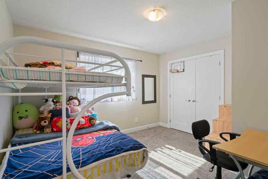 MLS® A2247873 - 818 Hampshire Crescent NE in Hampton Hills High River, Residential