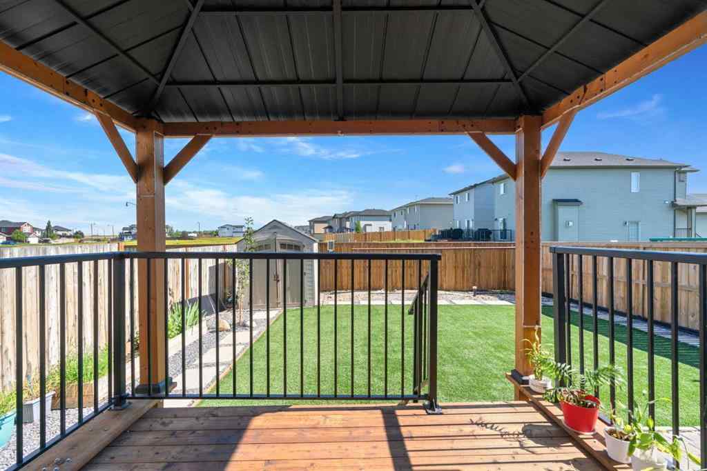MLS® A2247873 - 818 Hampshire Crescent NE in Hampton Hills High River, Residential