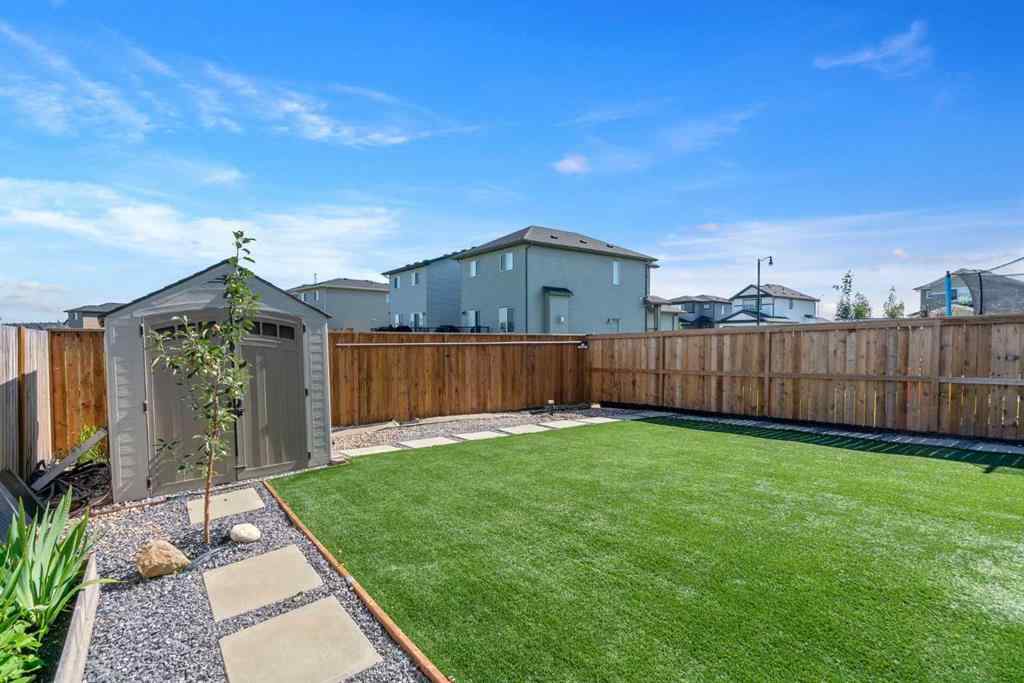 MLS® A2247873 - 818 Hampshire Crescent NE in Hampton Hills High River, Residential