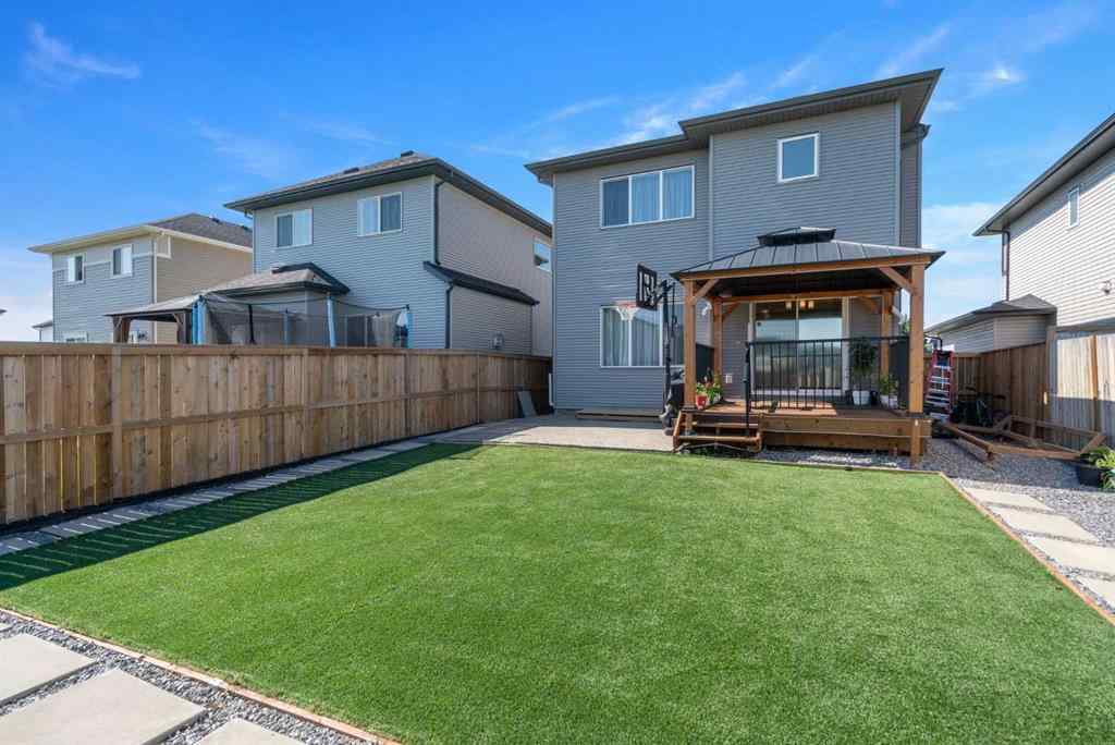 MLS® A2247873 - 818 Hampshire Crescent NE in Hampton Hills High River, Residential