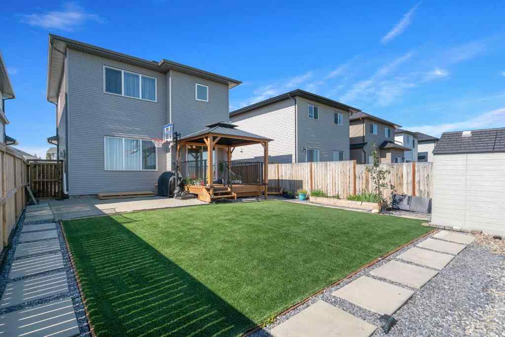 MLS® A2247873 - 818 Hampshire Crescent NE in Hampton Hills High River, Residential