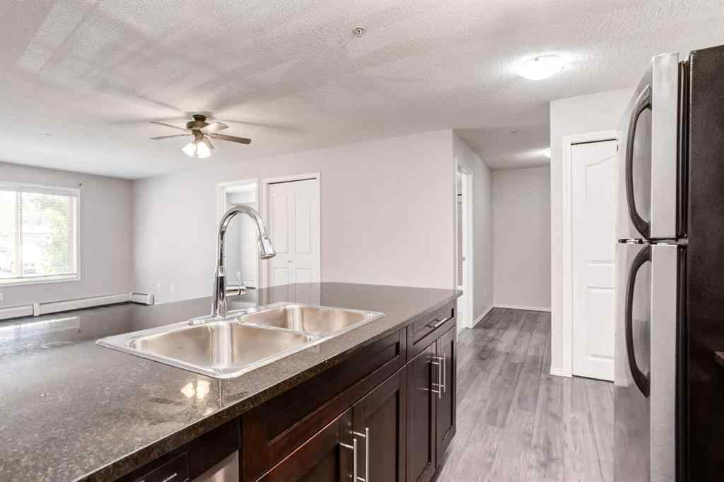 MLS® A2247884 - Unit #2108 403 Mackenzie Way SW in Downtown Airdrie, Residential