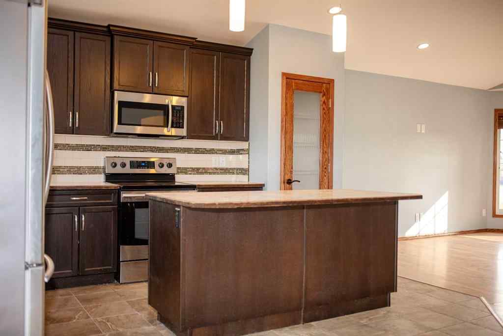 MLS® A2247904 - 38 Woodbine Avenue NW in Harvest Meadows Blackfalds, Residential