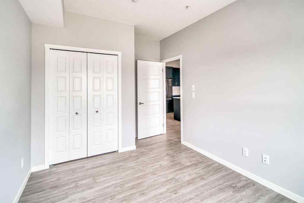 MLS® A2247917 - Unit #215 300 Harvest Hills Place NE in Harvest Hills Calgary, Residential