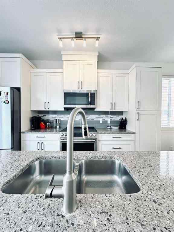 MLS® A2247919 - 641 Evanston Manor NW in Evanston Calgary, Residential