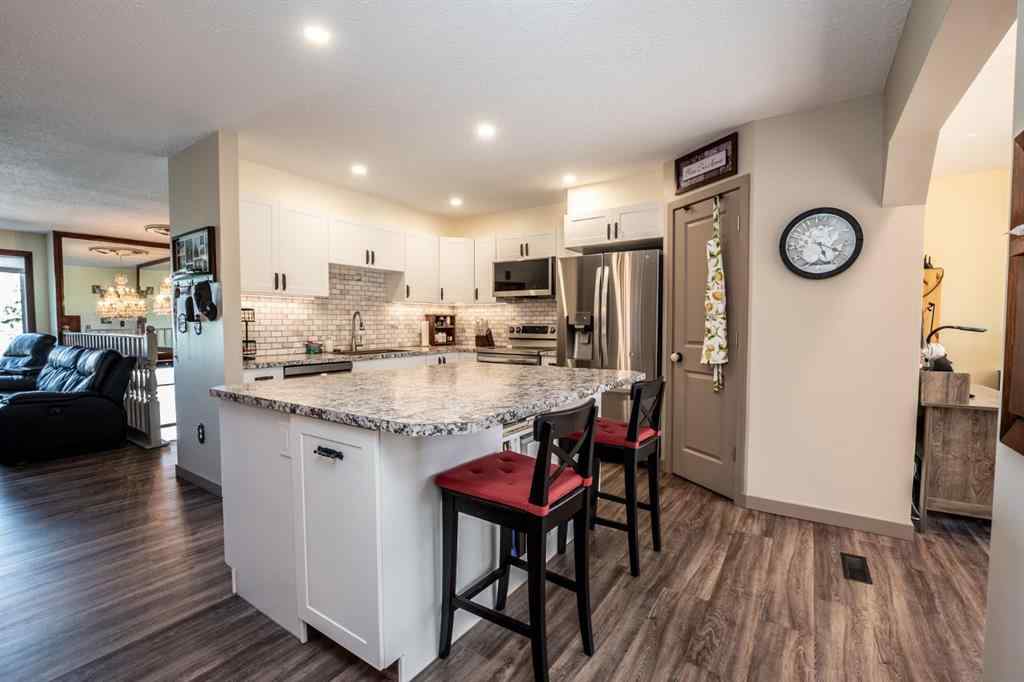 MLS® A2247945 - 911 12 Street SE in Emerson Lake Estates High River, Residential
