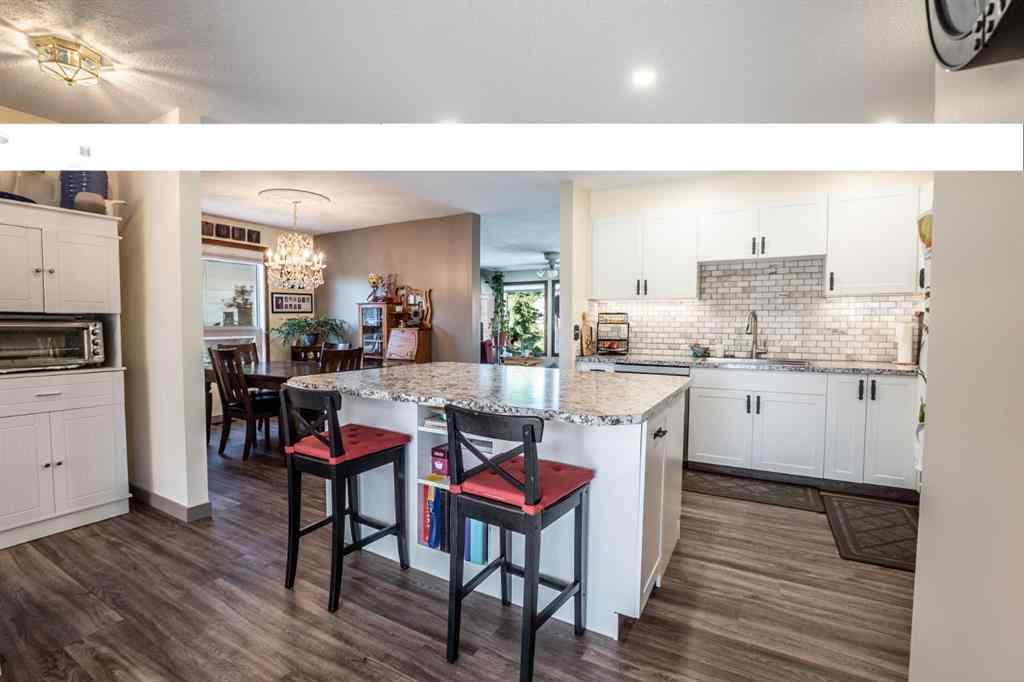 MLS® A2247945 - 911 12 Street SE in Emerson Lake Estates High River, Residential