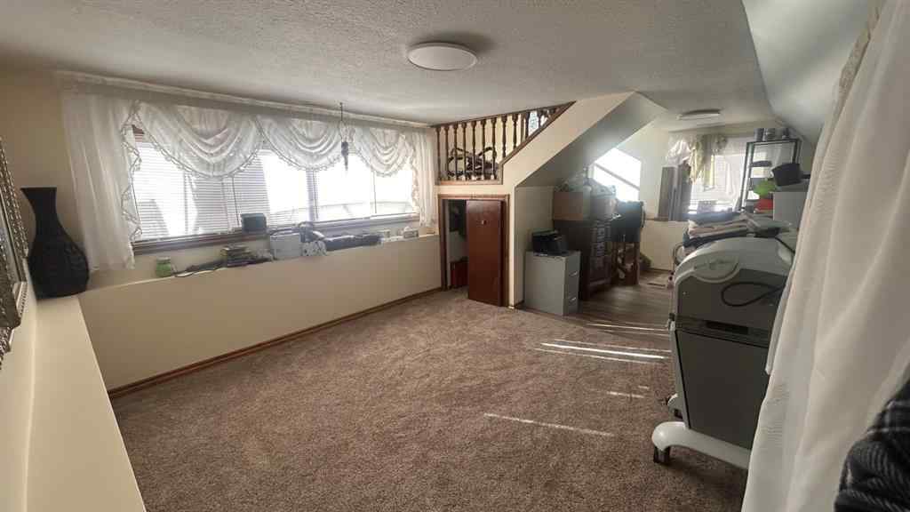 MLS® A2247945 - 911 12 Street SE in Emerson Lake Estates High River, Residential