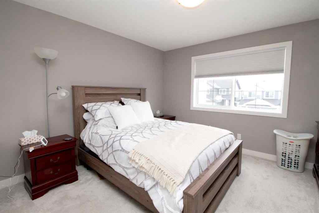 MLS® A2247966 - 103 Sunrise Common  in Sunset Ridge Cochrane, Residential