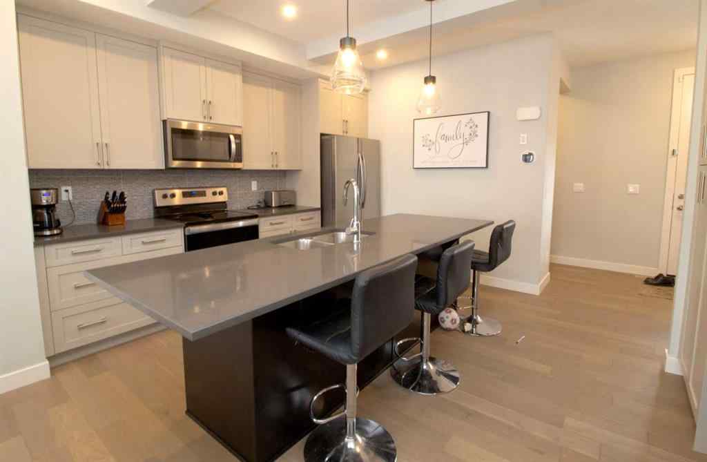 MLS® A2247966 - 103 Sunrise Common  in Sunset Ridge Cochrane, Residential