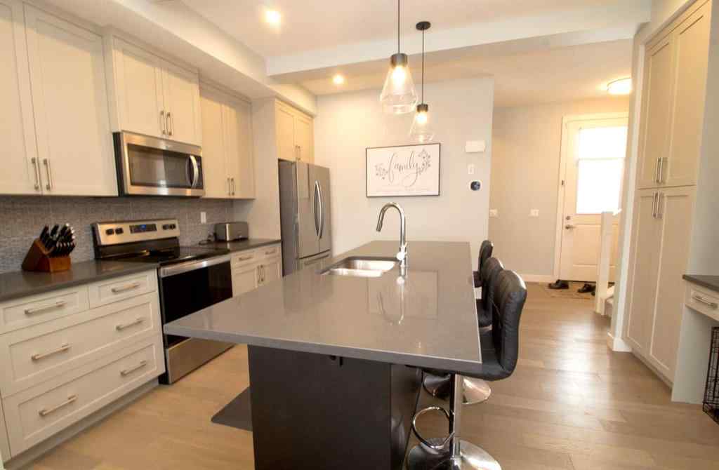 MLS® A2247966 - 103 Sunrise Common  in Sunset Ridge Cochrane, Residential