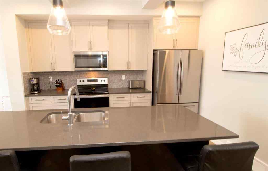 MLS® A2247966 - 103 Sunrise Common  in Sunset Ridge Cochrane, Residential
