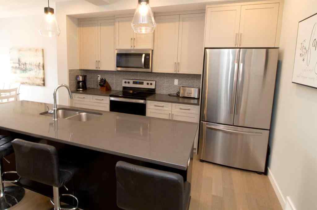 MLS® A2247966 - 103 Sunrise Common  in Sunset Ridge Cochrane, Residential