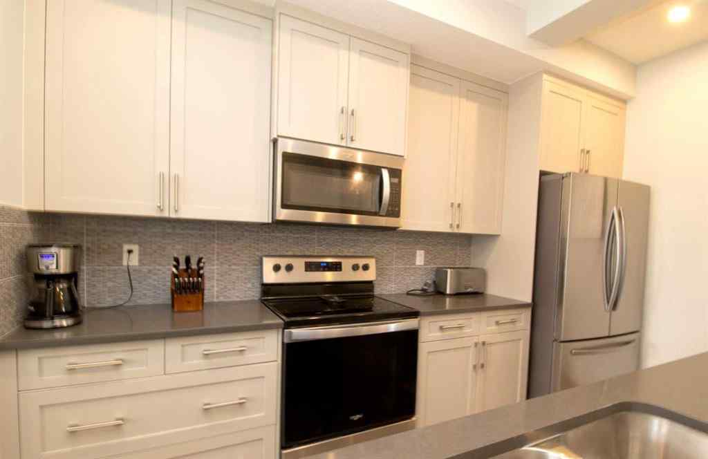MLS® A2247966 - 103 Sunrise Common  in Sunset Ridge Cochrane, Residential