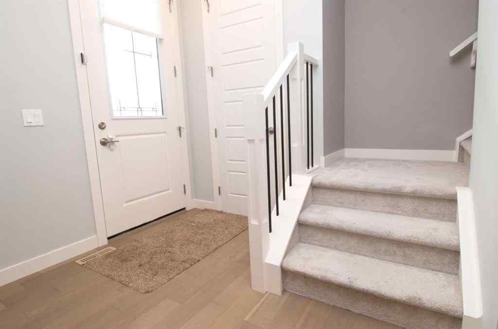 MLS® A2247966 - 103 Sunrise Common  in Sunset Ridge Cochrane, Residential