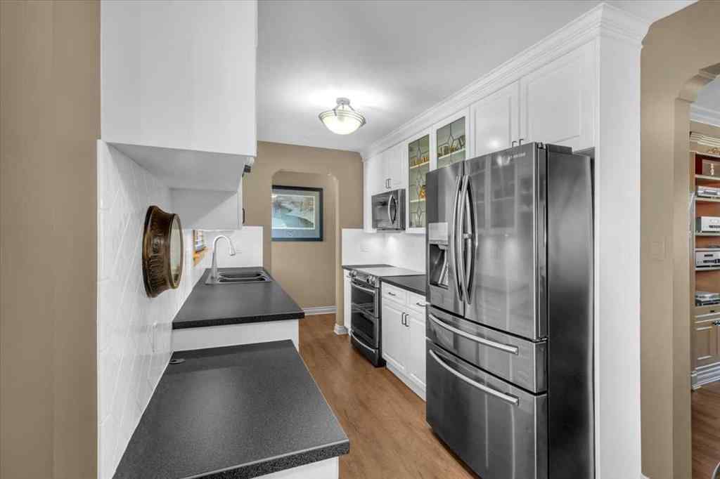 MLS® A2248014 - 2211 45 Street SE in Forest Lawn Calgary, Residential