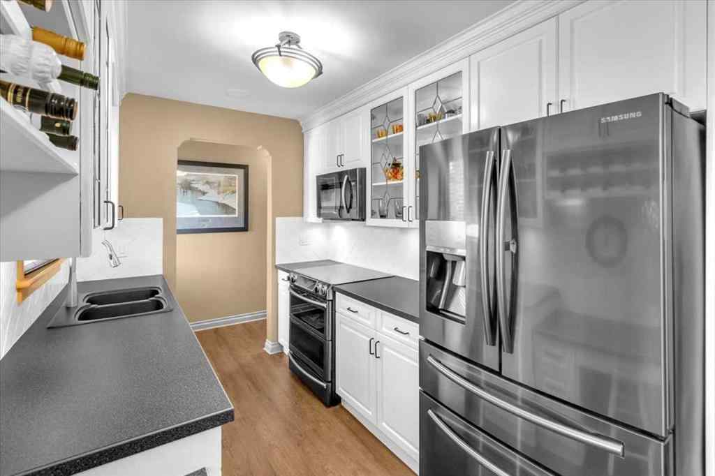 MLS® A2248014 - 2211 45 Street SE in Forest Lawn Calgary, Residential