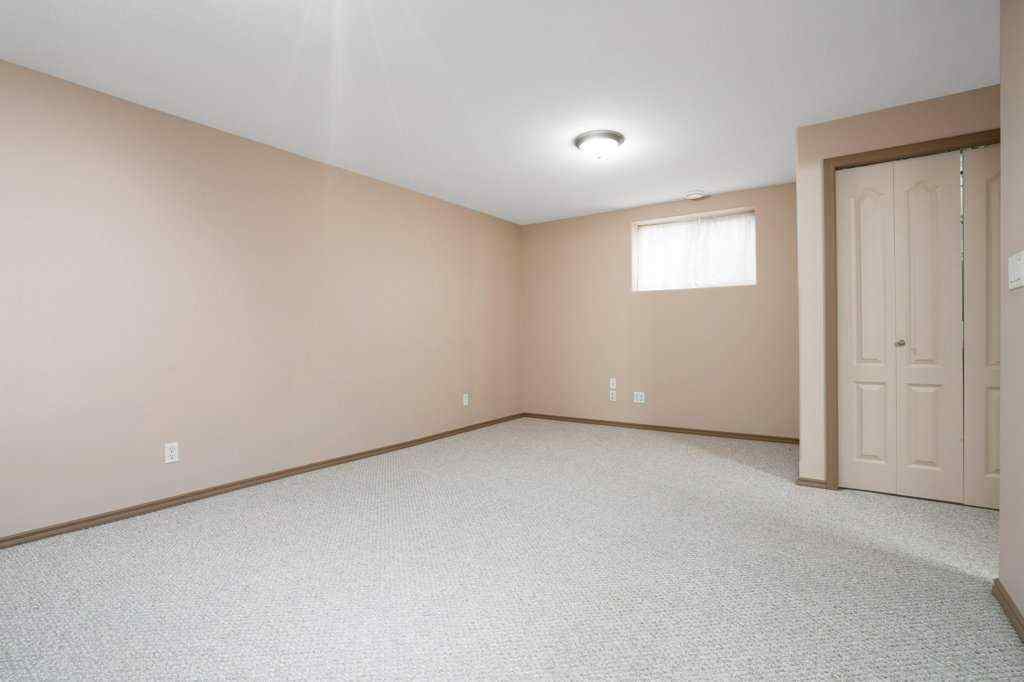 MLS® A2248023 - 42 Adamson Avenue  in Aspen Ridge Red Deer, Residential