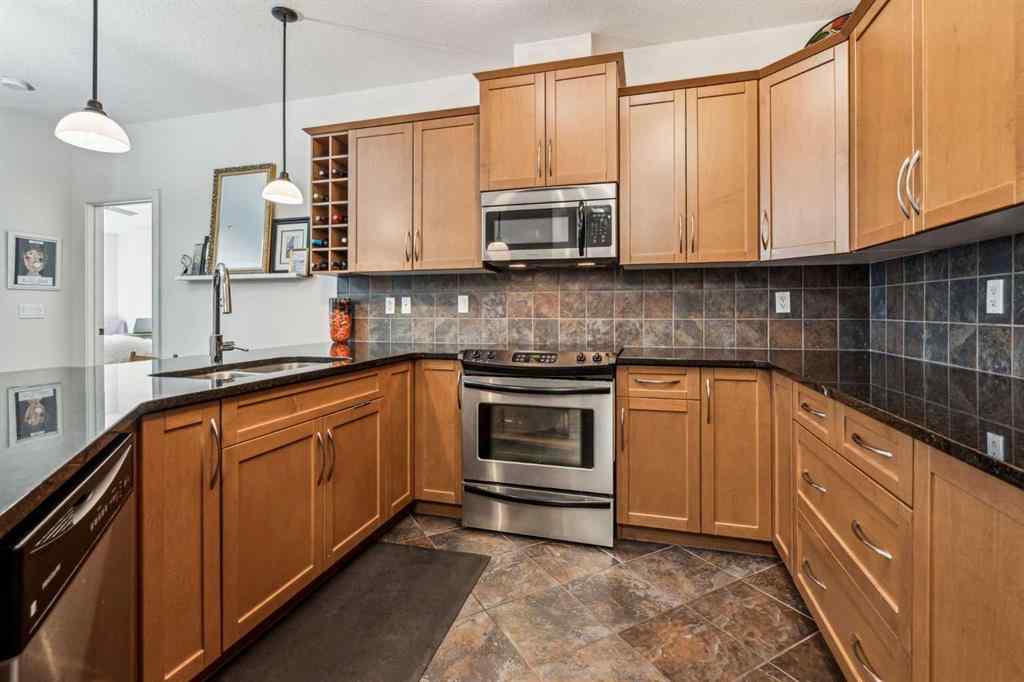 MLS® A2248029 - Unit #243 35 Aspenmont Heights SW in Aspen Woods Calgary, Residential