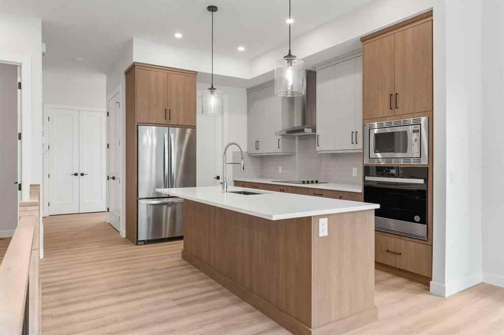 MLS® A2248046 - Unit #88 297 Riviera Way  in Riviera Cochrane, Residential