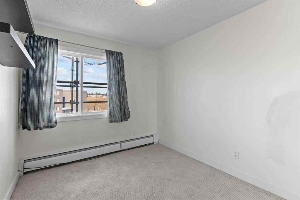 MLS® A2248053 - Unit #403 4455C Greenview Drive NE in Greenview Calgary, Residential
