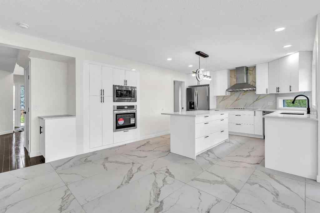 MLS® A2248062 - 919 Shawnee Drive SW in Shawnee Slopes Calgary, Residential