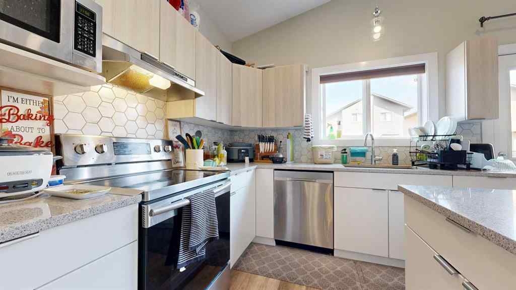 MLS® A2248070 - 11416 106 Avenue  in Westgate Grande Prairie, Residential