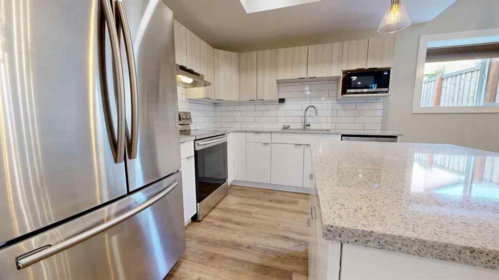 MLS® A2248070 - 11416 106 Avenue  in Westgate Grande Prairie, Residential