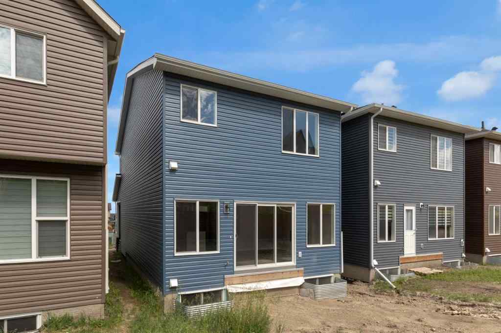 MLS® A2248116 - 209 Calhoun Crescent NE in Livingston Calgary, Residential