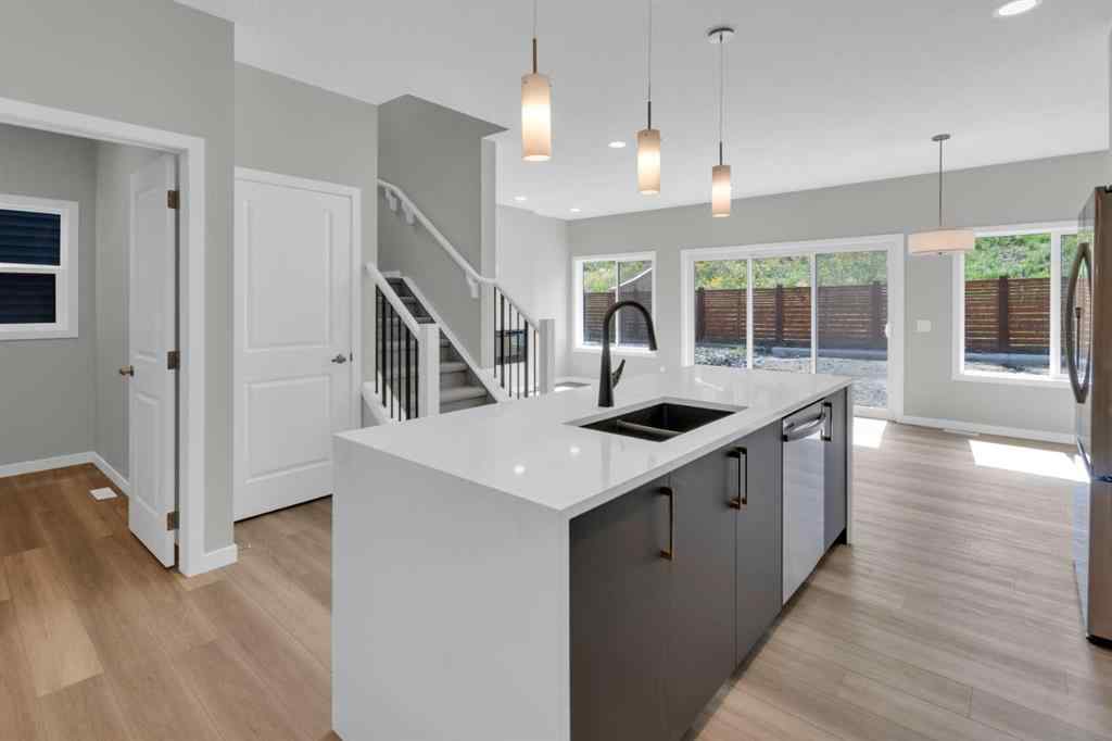 MLS® A2248116 - 209 Calhoun Crescent NE in Livingston Calgary, Residential