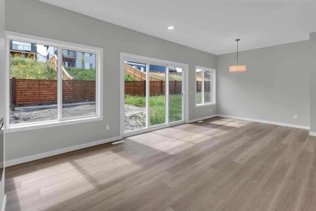 MLS® A2248116 - 209 Calhoun Crescent NE in Livingston Calgary, Residential