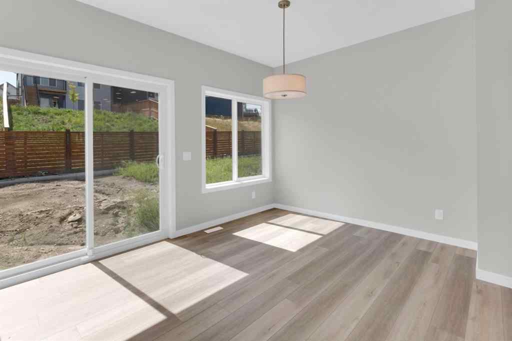 MLS® A2248116 - 209 Calhoun Crescent NE in Livingston Calgary, Residential