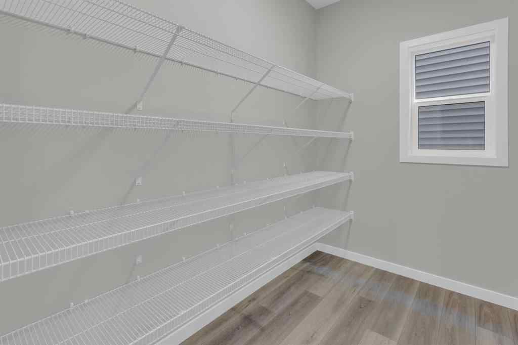 MLS® A2248116 - 209 Calhoun Crescent NE in Livingston Calgary, Residential