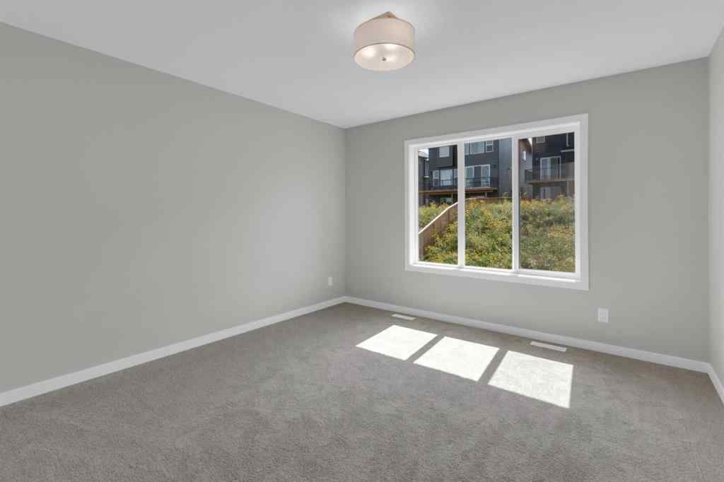 MLS® A2248116 - 209 Calhoun Crescent NE in Livingston Calgary, Residential