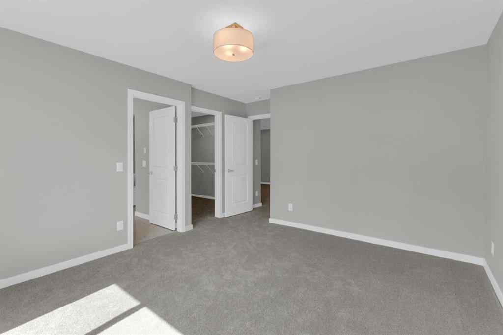 MLS® A2248116 - 209 Calhoun Crescent NE in Livingston Calgary, Residential