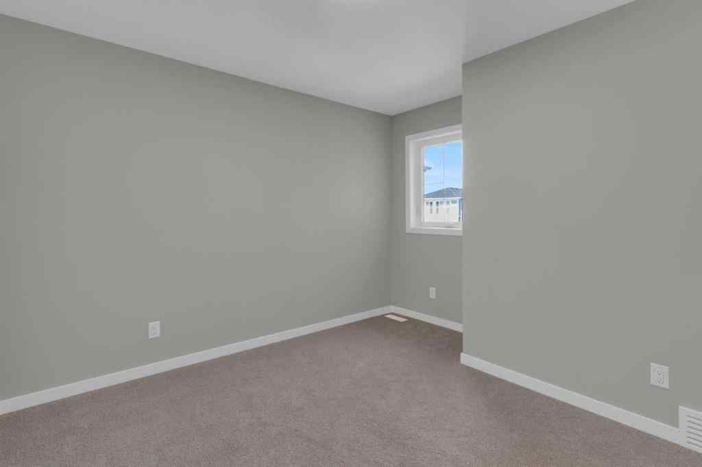 MLS® A2248116 - 209 Calhoun Crescent NE in Livingston Calgary, Residential