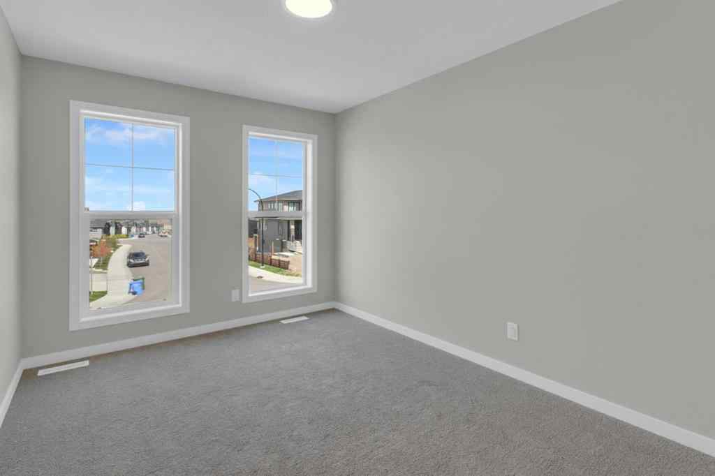 MLS® A2248116 - 209 Calhoun Crescent NE in Livingston Calgary, Residential