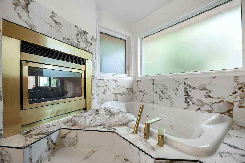MLS® A2248121 - 113 Straddock Terrace SW in Strathcona Park Calgary, Residential