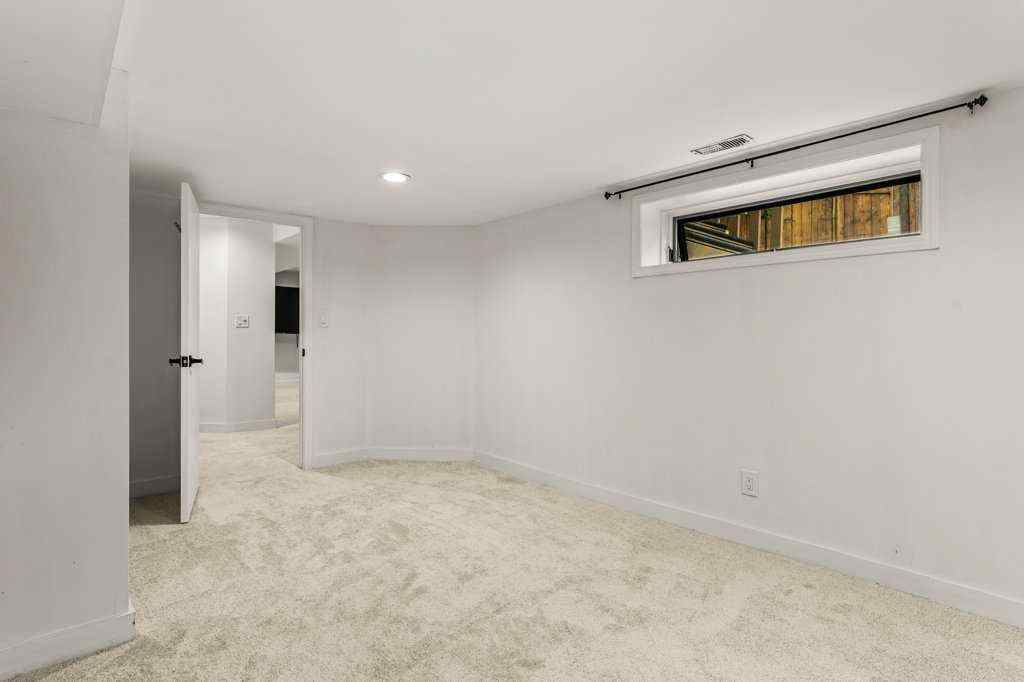 MLS® A2248121 - 113 Straddock Terrace SW in Strathcona Park Calgary, Residential
