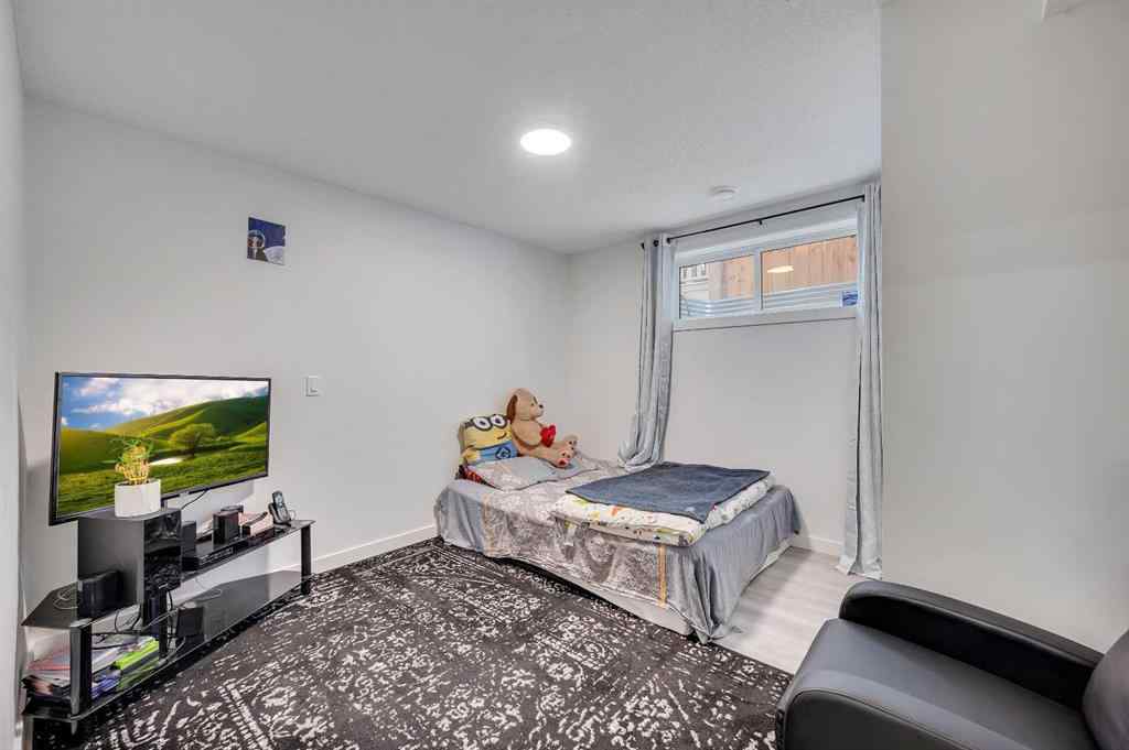 MLS® A2248211 - 239 Sundown Road  in Sunset Ridge Cochrane, Residential