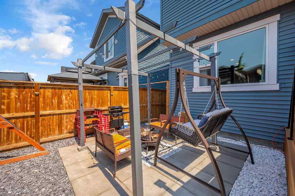 MLS® A2248211 - 239 Sundown Road  in Sunset Ridge Cochrane, Residential