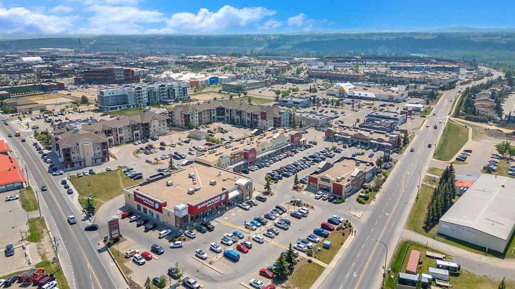 MLS® A2248211 - 239 Sundown Road  in Sunset Ridge Cochrane, Residential
