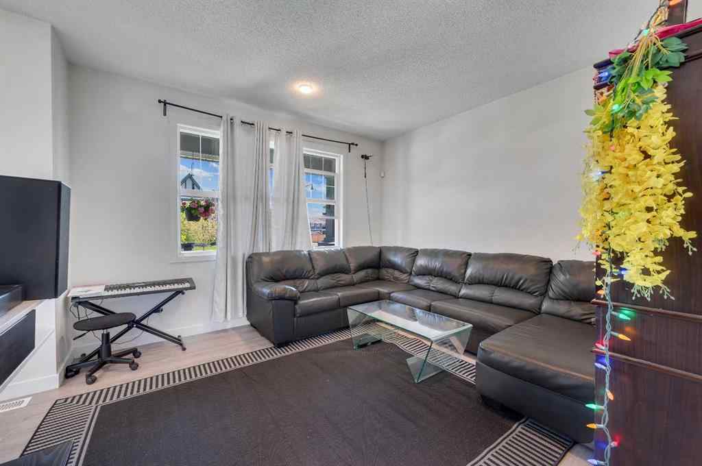 MLS® A2248211 - 239 Sundown Road  in Sunset Ridge Cochrane, Residential