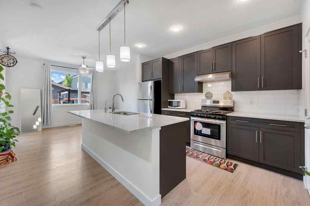 MLS® A2248211 - 239 Sundown Road  in Sunset Ridge Cochrane, Residential