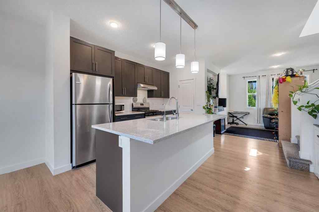 MLS® A2248211 - 239 Sundown Road  in Sunset Ridge Cochrane, Residential
