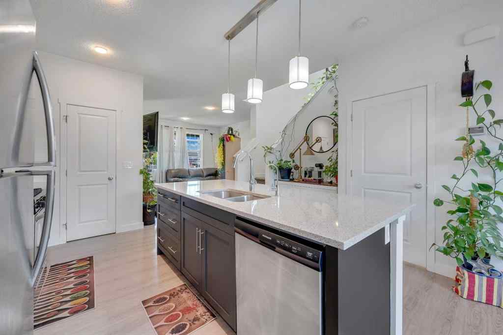 MLS® A2248211 - 239 Sundown Road  in Sunset Ridge Cochrane, Residential